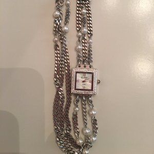 Silver and pearl watch